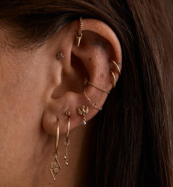 Anna Nina Love Bird Piercing Front 14K