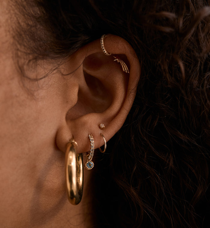 Anna Nina Meteor Piercing Front 14K