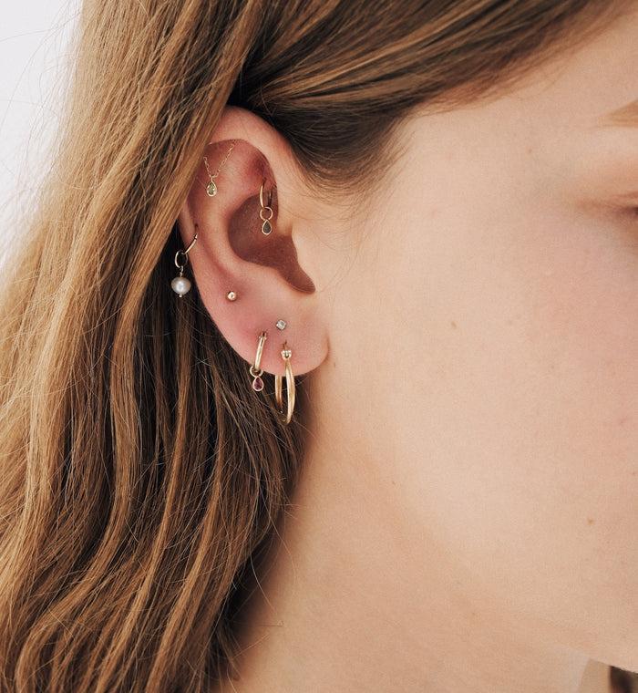 Anna Nina Simplicity Piercing Front 14K