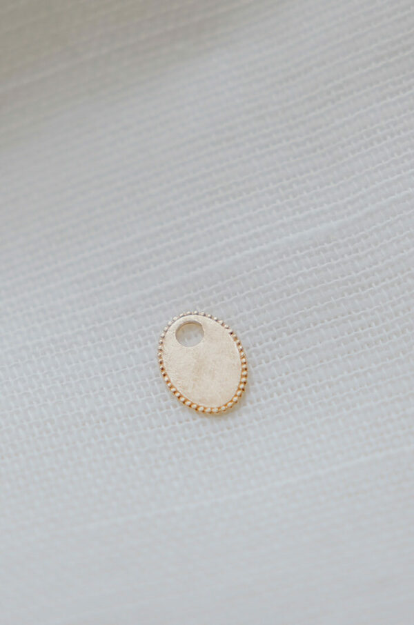 gftd Flower ovaal ear charm