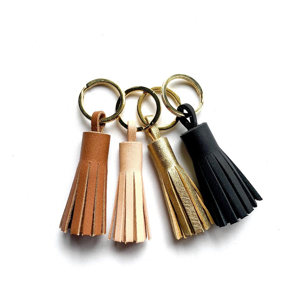 léonny cha Leren sleutelhanger met pompon