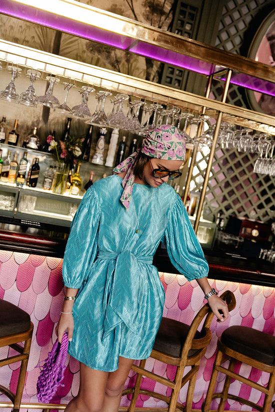 les jumelles Asher korte jurk turquoise