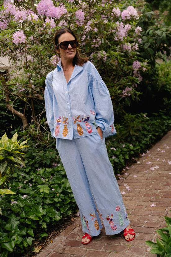 les jumelles Flora broek blauwe strepen