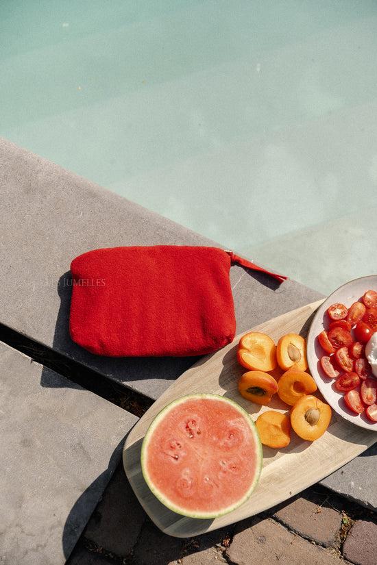 les jumelles Pia make-up tas mandarijnrood