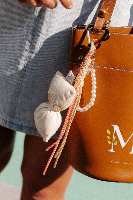 Les Jumelles Sleutelhanger Met Strik In Ecru