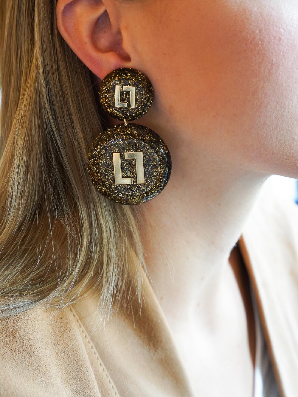 Lott. Gioielli Gouden Glitter Oorbellen Larissa Logo