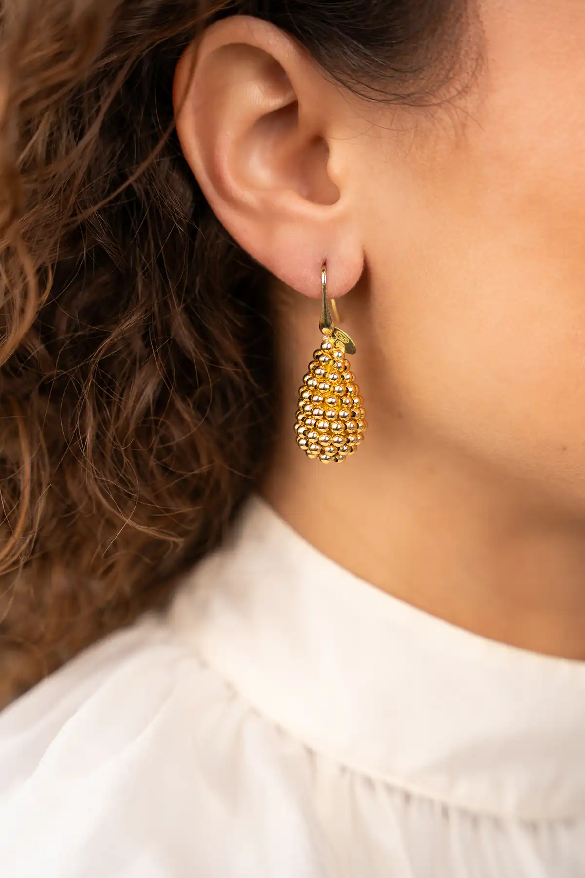 Lott. Gioielli Goudkleurige Oorbellen Amy Cone XS