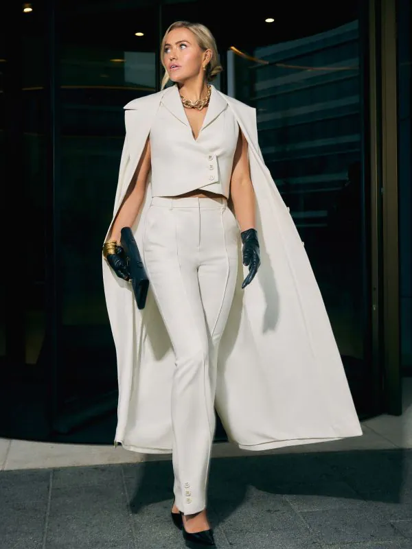 nikkie Aansluitende flared pantalon met naden en N-knopen