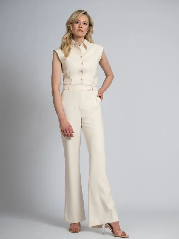 nikkie Aansluitende jumpsuit met rij FH knopen en wijde pijpen