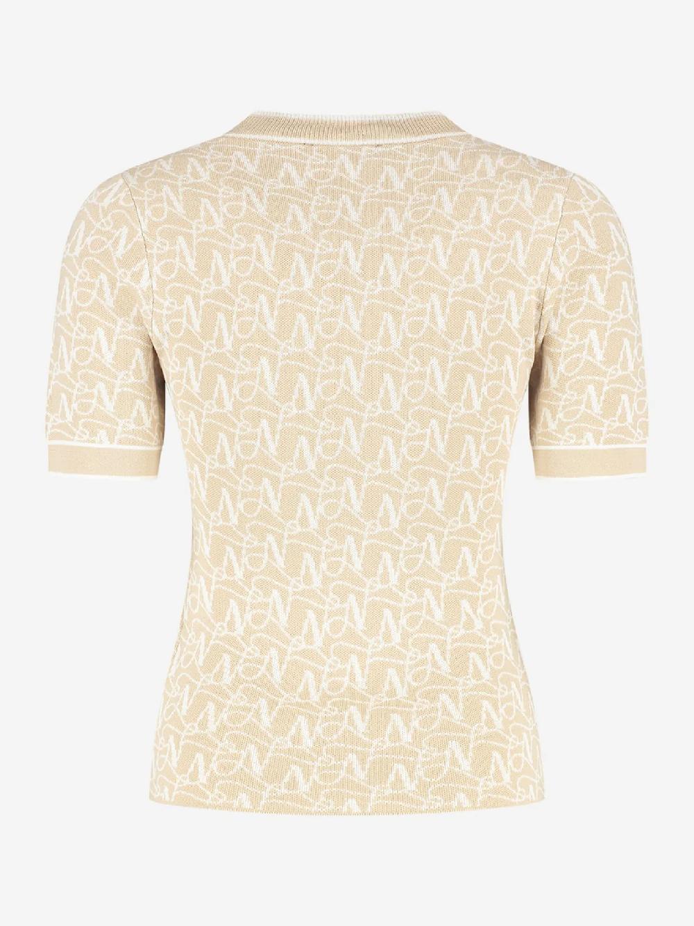 Nikkie Aansluitende Top Met Logo Patroon En Ketting Detail