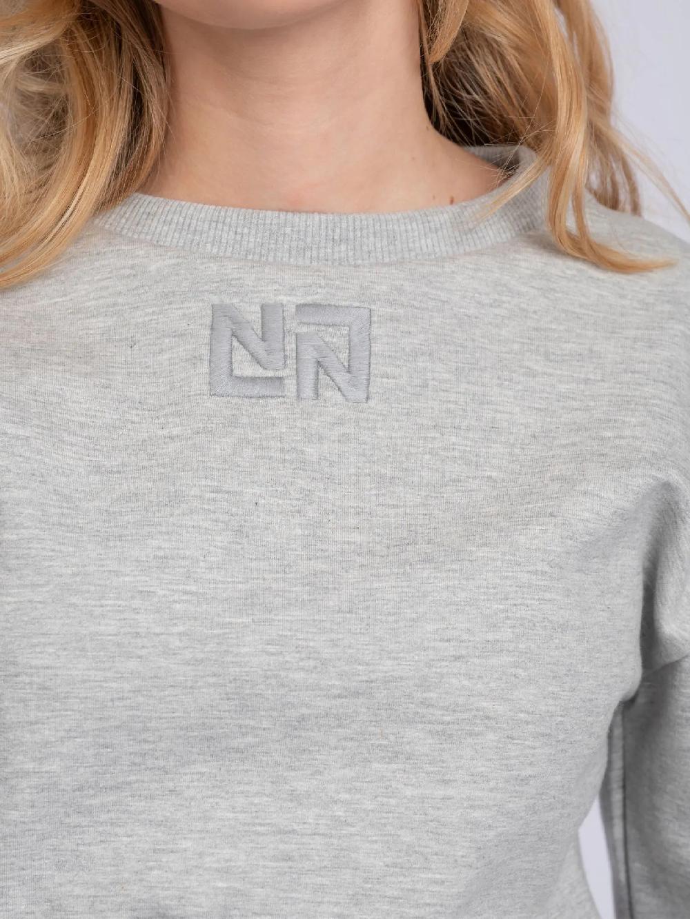 Nikkie Cropped Sweater Met Brede Elastische Tailleband