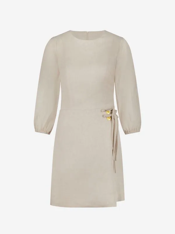 nikkie Gemêleerde jurk met ballonmouwen en strikdetails