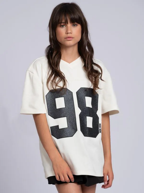 nikkie Losvallend varsity T-shirt met grafische print