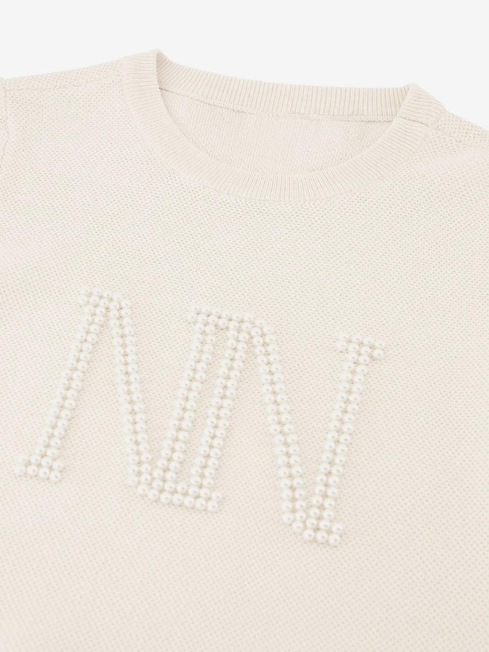 Nikkie Gebreide Top Met NN Parel Logo