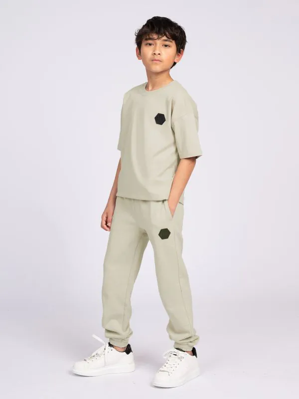 nikkie Losvallende joggingbroek met logo patch