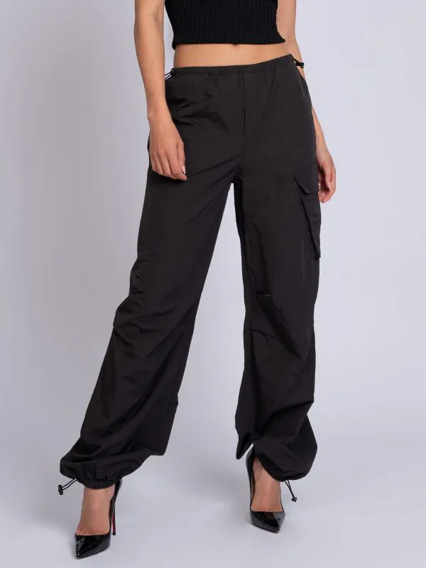 nikkie Losvallende parachute broek met trekkoorden