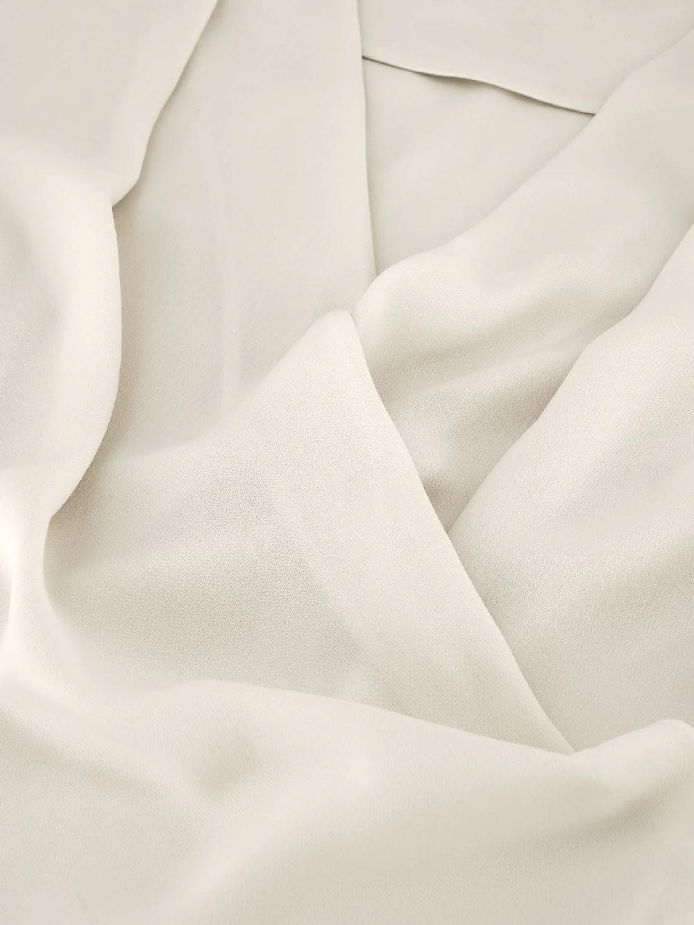 Nikkie Losvallende Top Met Overslag V-hals