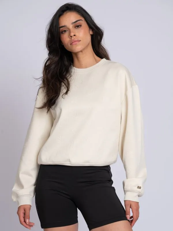 nikkie Losvallende trui met logo patroon