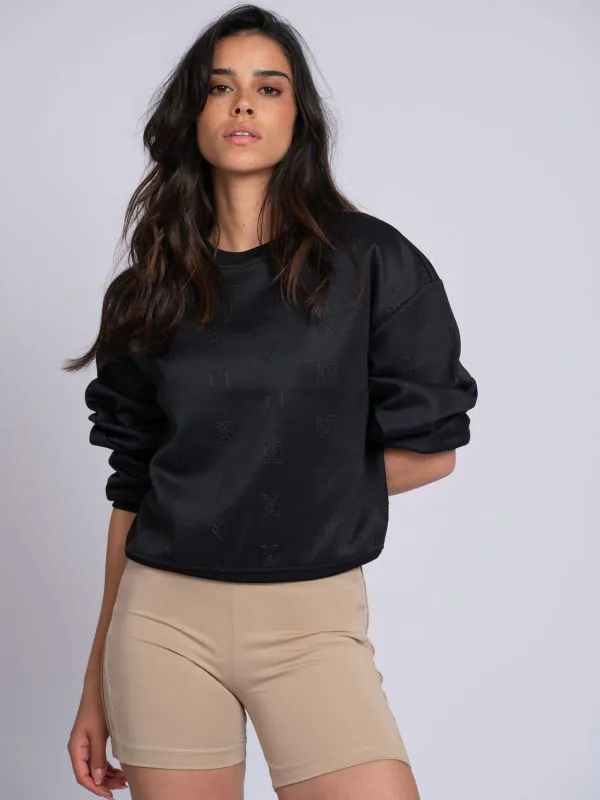 nikkie Losvallende trui met logo patroon