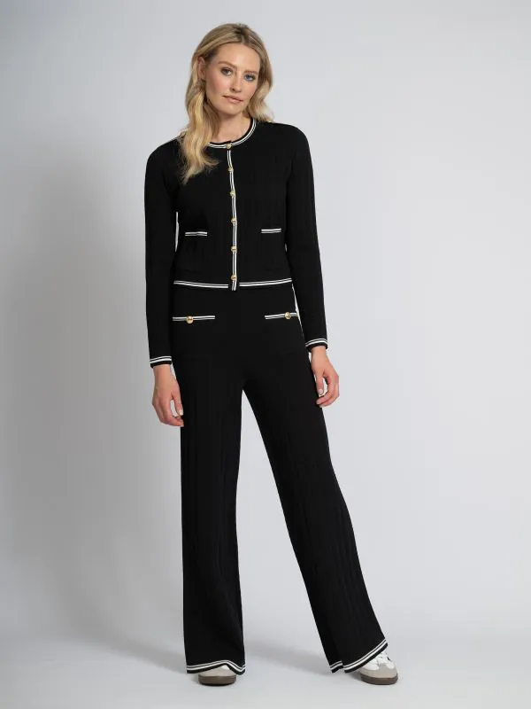 nikkie Opengebreide broek met witte biezen