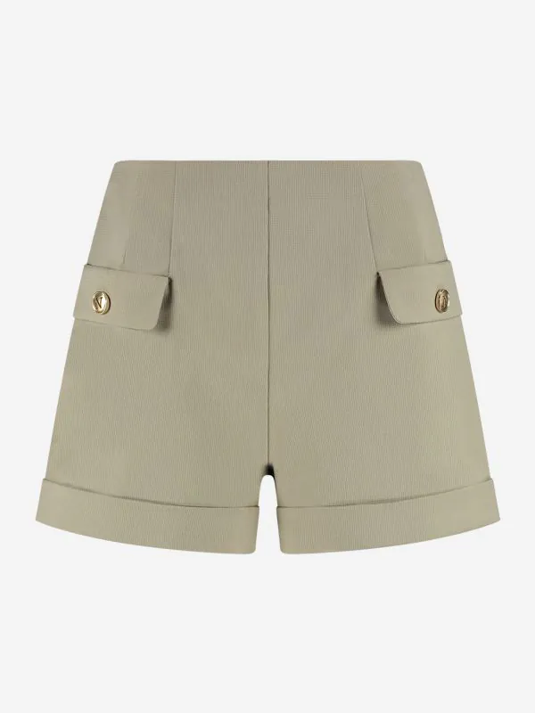 nikkie Short met omgeslagen pijpen en klepzakken