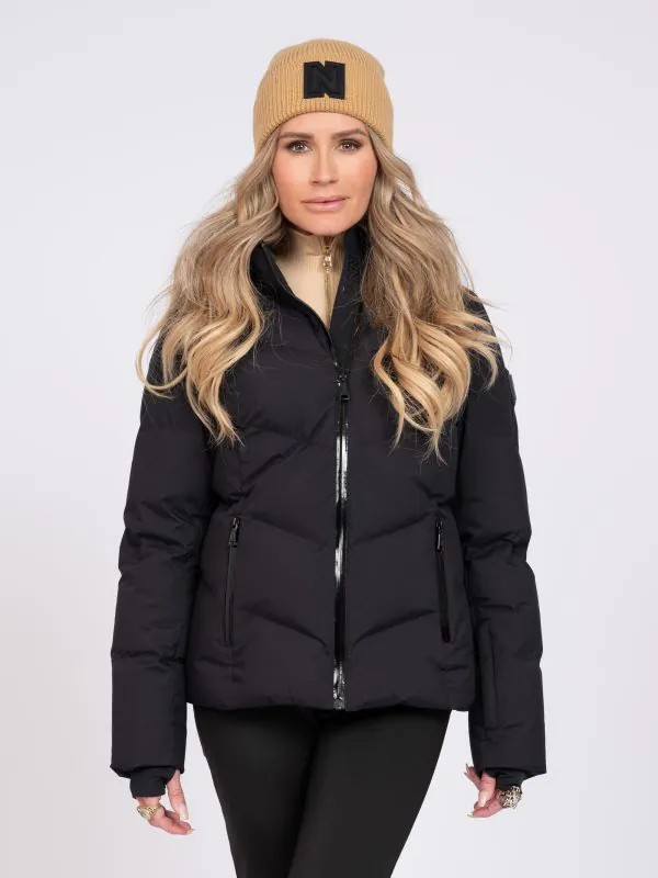 nikkie Ski jas met capuchon en sneeuwvangers