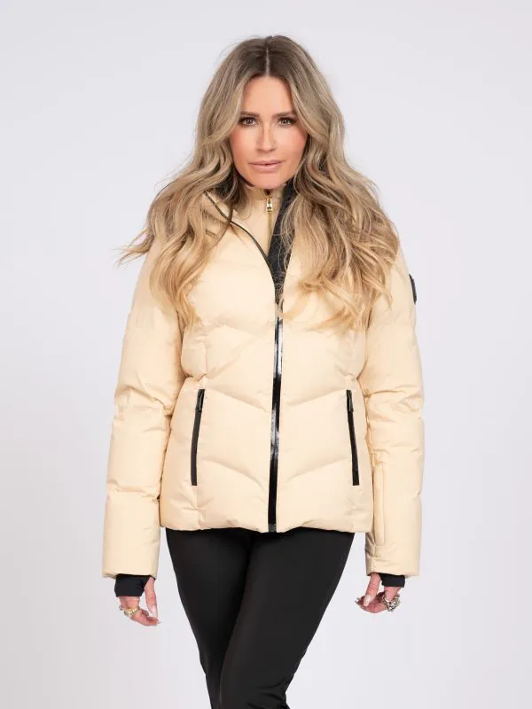 nikkie Ski jas met capuchon en sneeuwvangers