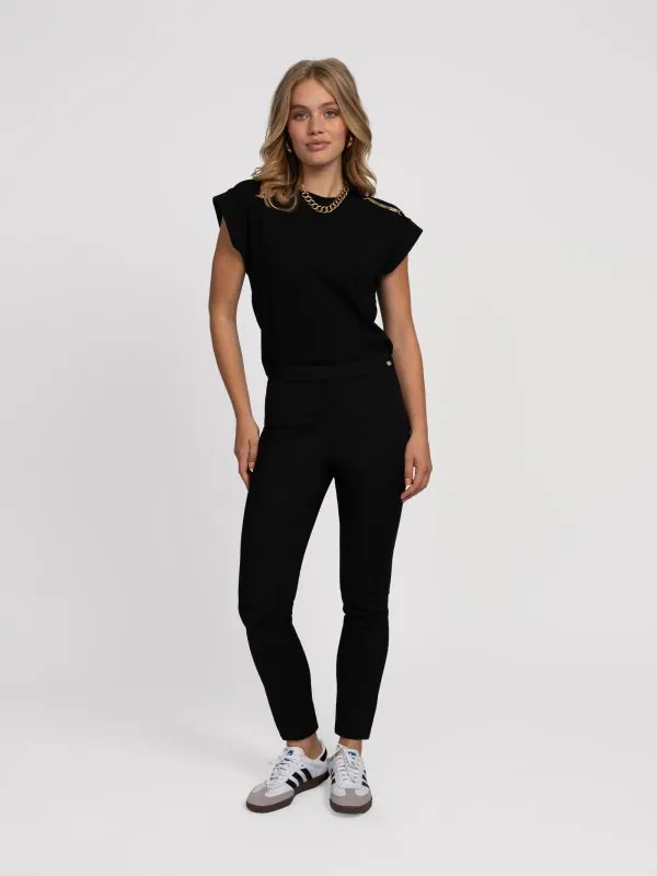 nikkie Skinny broek met ketting details