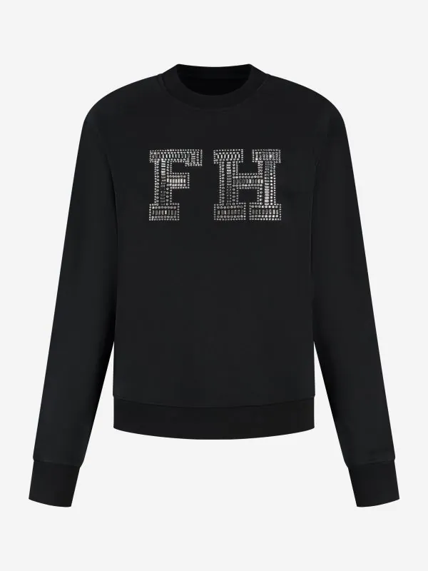 nikkie Wijdvallende sweater met FH logo van studs
