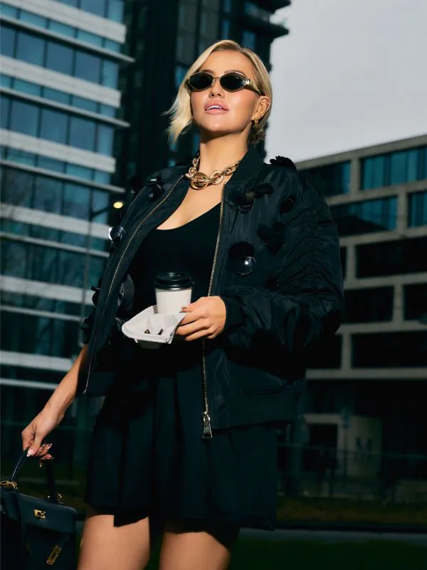 nikkie Oversized bomber jack met pailletten en geplooide mouwen