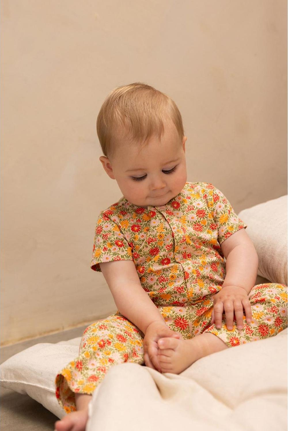 Noppies Jumpsuit Millcreek - Floral Pattern Orange