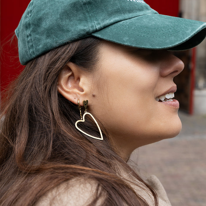 oozoo Goudkleurige oorbellen met twee harten en een zwarte strass