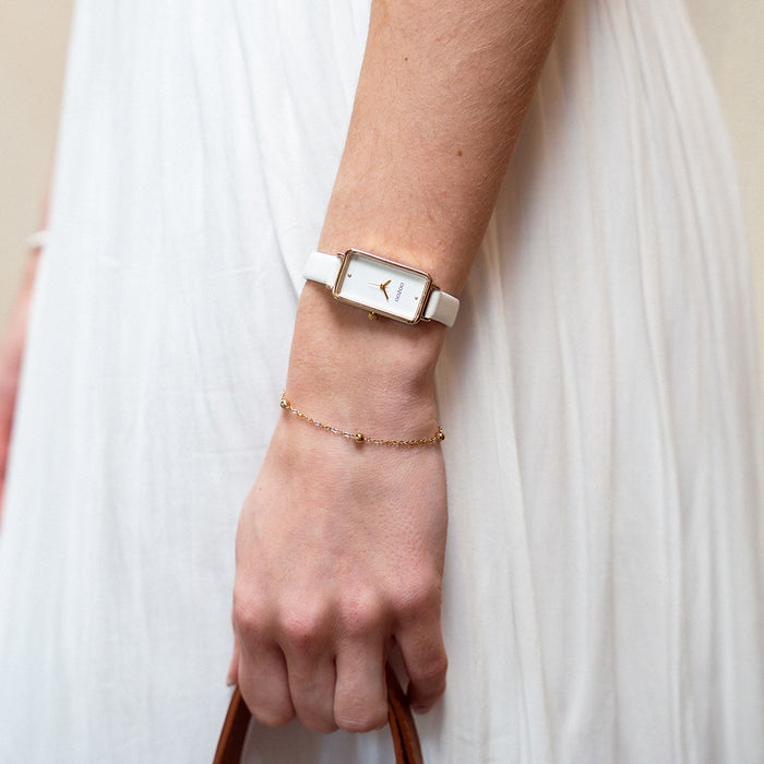 oozoo Goudkleurige OOZOO horloge met witte leren band - C11530