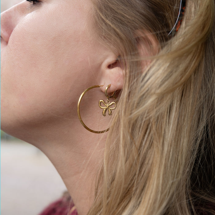 oozoo Goudkleurige oorringen met strikjes