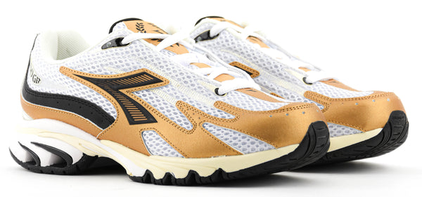 Paul Warmer DIADORA MYTHOS PROPULSION 280 WHITE BLACK GOLD