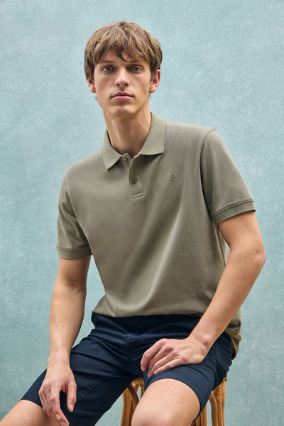 polo club Lichtgroene polo van linnen en katoen met twee knopen en geborduurd monogram