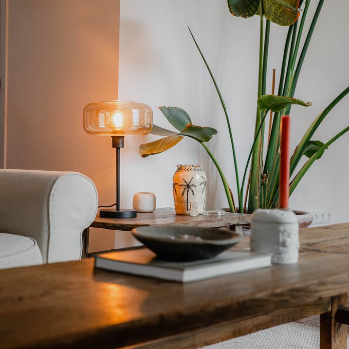 qazqa Art deco tafellamp zwart met amber glas - Bizle