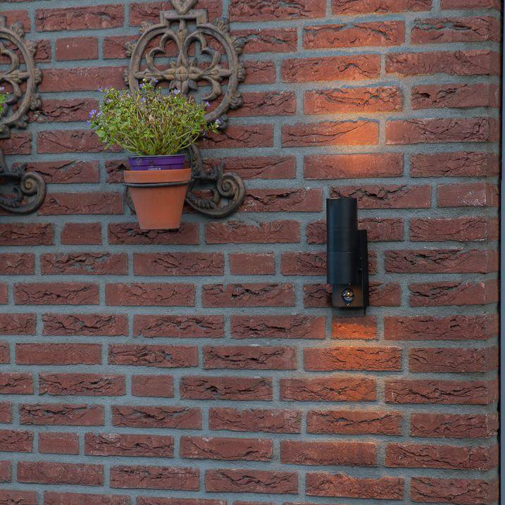 qazqa Buitenwandlamp zwart 2-lichts met bewegingssensor IP44 - Duo