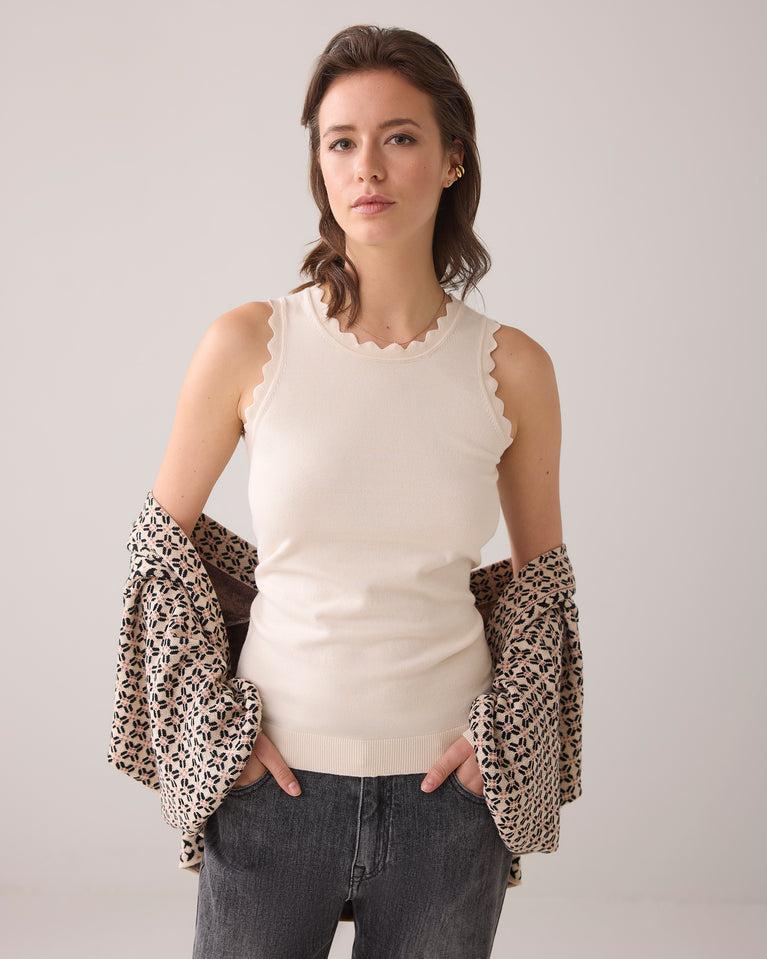 summum Singlet met schulpdetails