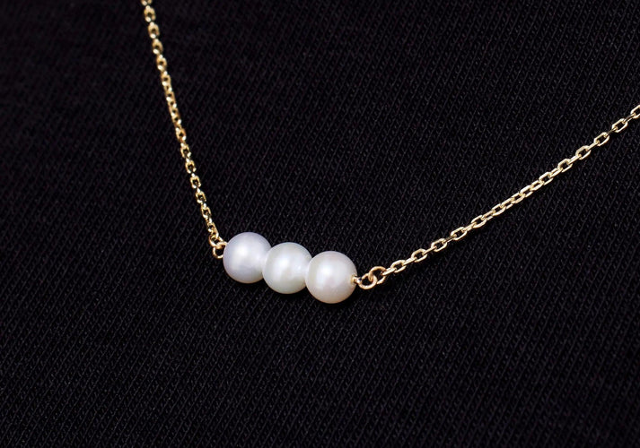 Tov Essentials Geschakelde Parel Ketting 14 Karaat Goud