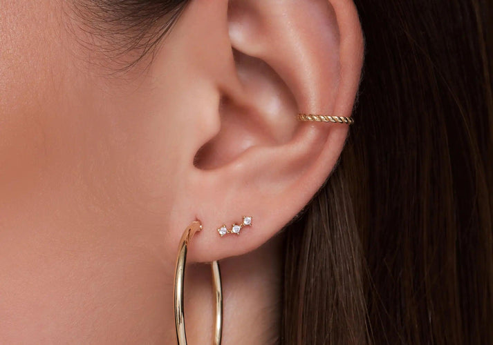 Tov Essentials Gedraaide Ear Cuff 14 Karaat Goud